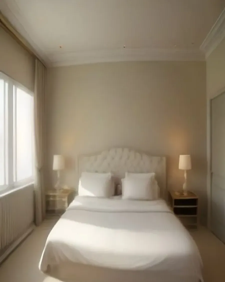 Residence bedroom with white linen and brass lamps